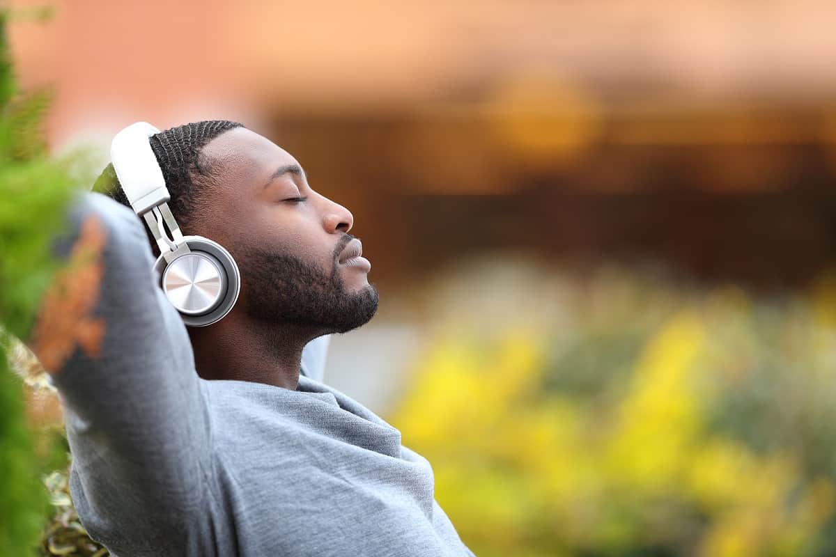 man listening to music and relaxing